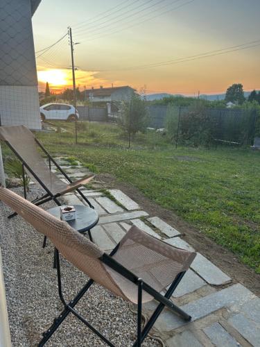 a chair and a table on a patio at Chambre Studio B&B in Mazamet