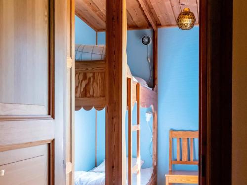 Katil atau katil-katil dalam bilik di 4 star holiday home in SÅGMYRA