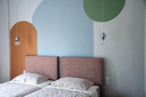 Giường trong phòng chung tại Terra Green 2