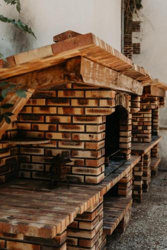 a brick oven with a long line of bricks at La Petite Motte in Ceton