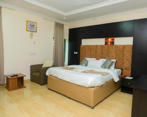 Voodi või voodid majutusasutuse Proximus Hotel and Suites toas