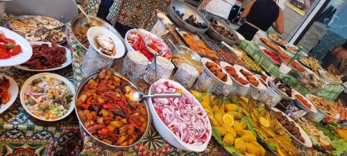 a buffet of different types of food on a table at Casa Isabel in Mazara del Vallo