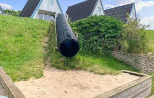 a large drainage pipe on the side of a house at Stunning Apartment In Knebel in Knebel