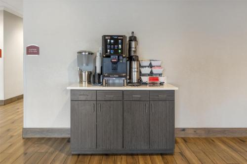a counter with a coffee maker on top of it at Best Western Plus Elizabethtown Inn & Suites in Elizabethtown