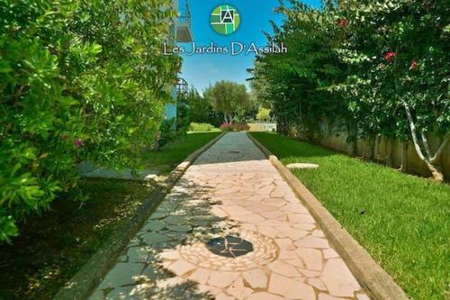 Ein Garten an der Unterkunft Les Jardins d'Assilah
