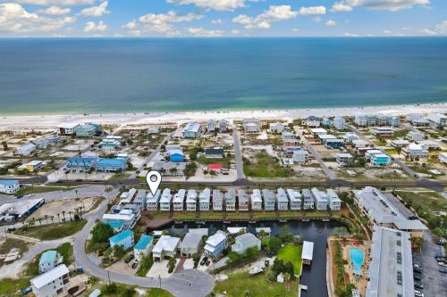 an aerial view of a resort near the beach at Two if by Sea in Mexico Beach