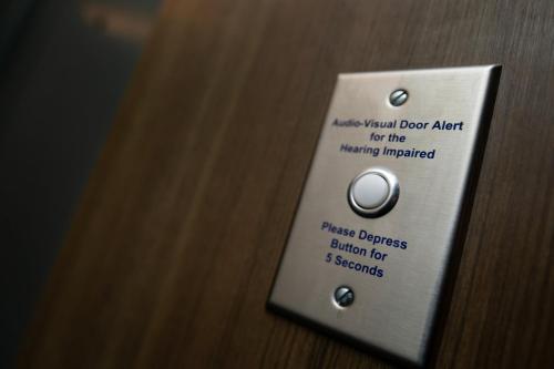 a close up of a remote control on a door at Hotel Indigo Chattanooga - Downtown by IHG in Chattanooga