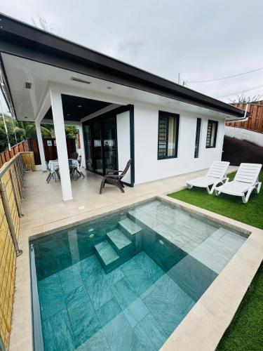 Foto Villa Tematahi - maison moderne avec piscine privée 1