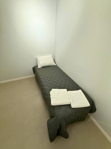 Una cama o camas en una habitación de Studios 422