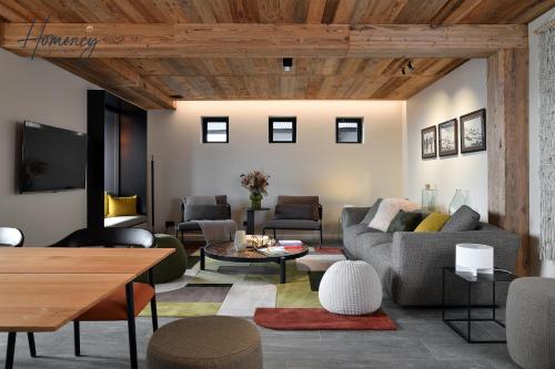 Homency - Chalet White Stone Neige et Soleil