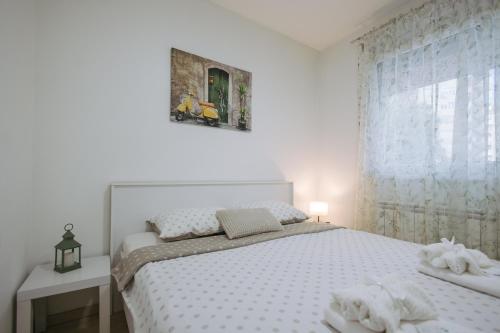 Postel nebo postele na pokoji v ubytování Apartman Vukota Pirot