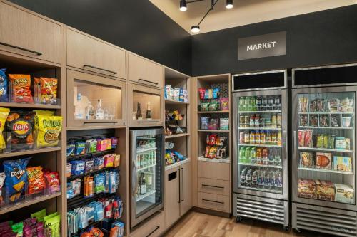 a grocery store aisle with lots of food and drinks at Residence Inn by Marriott San Luis Obispo in San Luis Obispo