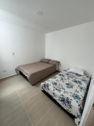 Ένα ή περισσότερα κρεβάτια σε δωμάτιο στο Cantabria casa Q6