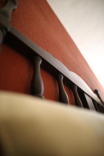 a close up of the strings of a violinophone at Hotel Montetaxco in Taxco de Alarcón