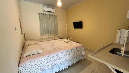 Ένα ή περισσότερα κρεβάτια σε δωμάτιο στο Portal Mágico