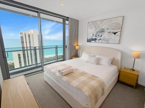 Postel nebo postele na pokoji v ubytování Luxury Signature Stay Stunning Ocean Views Lvl27