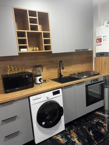 Η κουζίνα ή μικρή κουζίνα στο Apartament 1 central cu parcare privata