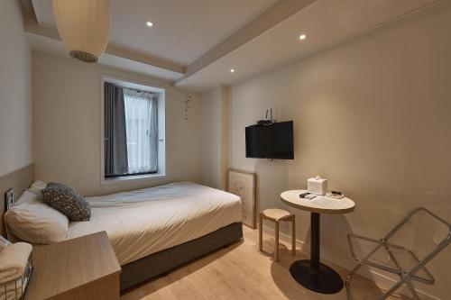 Letto o letti in una camera di Artravel Home