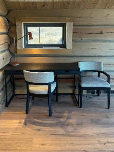 Χώρος καθιστικού στο Luxurious Log Cabin At Mostertoppen