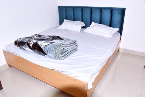 Postel nebo postele na pokoji v ubytování Ramas home stay