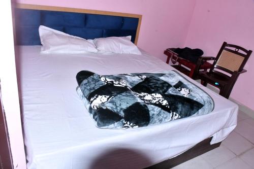 Postel nebo postele na pokoji v ubytování Ramas home stay