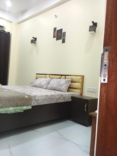 Postel nebo postele na pokoji v ubytování Ramas home stay
