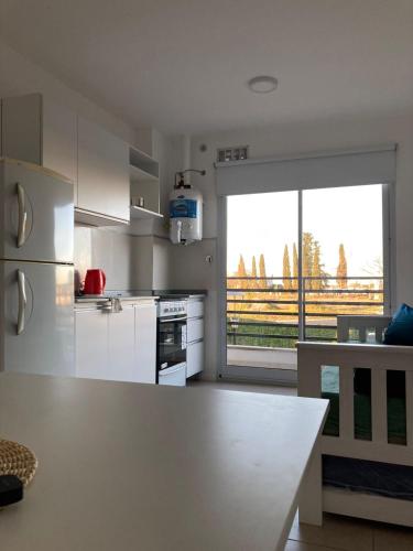 Η κουζίνα ή μικρή κουζίνα στο Como en casa