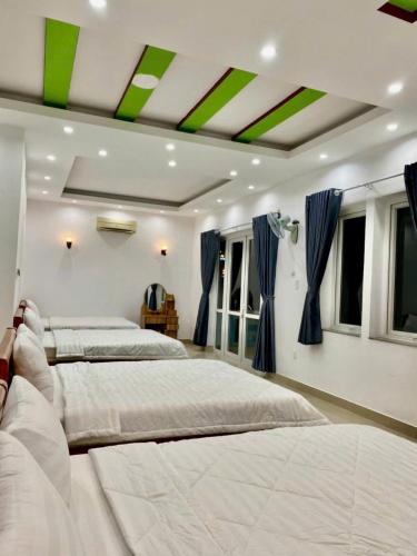 Postel nebo postele na pokoji v ubytování Phố Biển 3