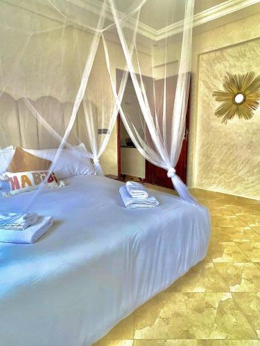 Ένα ή περισσότερα κρεβάτια σε δωμάτιο στο Marrakech home