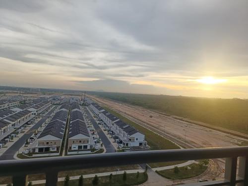 an aerial view of a parking lot at an airport at Sweet Escape at Splashmania in Banting