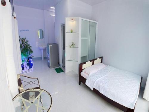 Ένα ή περισσότερα κρεβάτια σε δωμάτιο στο Homestay No Stress
