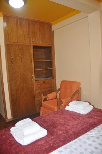 Кровать или кровати в номере Comodoro departamentos Oruro Bolivia