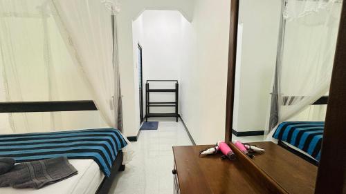 Sigiriya Danu Homestayにあるベッド