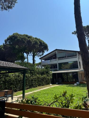 a large house with trees in front of it at Casa dei Pini Blu in Golem