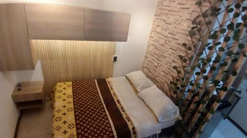 Postel nebo postele na pokoji v ubytování Apartaestudio Rionegro cerca Aeropuerto