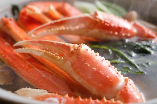 a plate of food with crabs on a plate at Yoshiharu in Toyooka