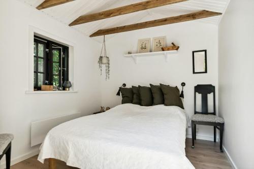 Ένα ή περισσότερα κρεβάτια σε δωμάτιο στο Scandinavian Bohemian On Protected Land