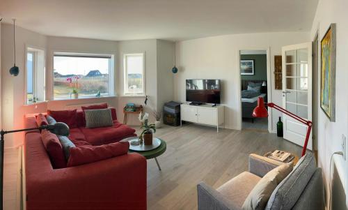 TV a/nebo společenská místnost v ubytování Charming Town House In Thyborøn Near The North Sea