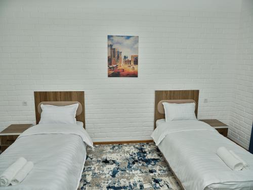 Katil atau katil-katil dalam bilik di Siab Boutique Hotel