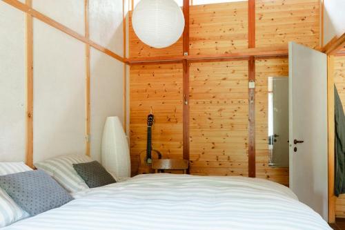 Postel nebo postele na pokoji v ubytování Original Home Embraced By Nature