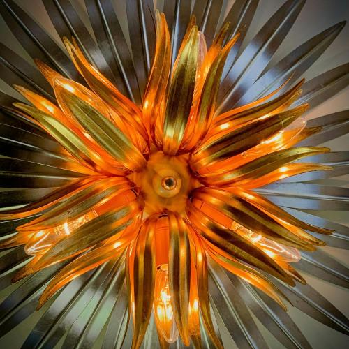 a close up of a glass flower on a table at Stylish Holiday Apartment On Rügen Island in Rambin