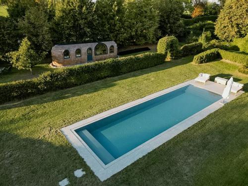 Πισίνα στο ή κοντά στο Feel Grounded In Igloo House With Pool And Gym