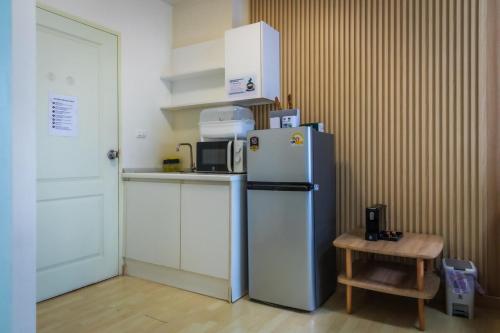 Η κουζίνα ή μικρή κουζίνα στο Soft bed,2TVs,many resto shops