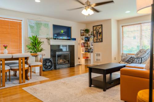 a living room with a couch and a fireplace at Modern Luxury Home, Green Lake, Seattle in Seattle