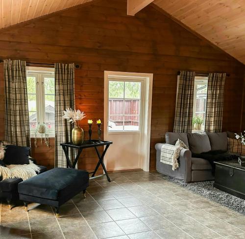 Zona de estar de Sunny Cabin Near Gautefall