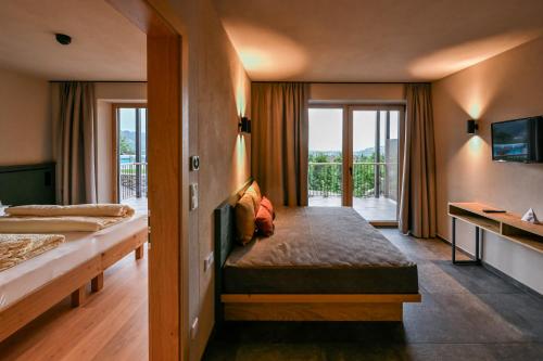 Giường trong phòng chung tại Residence Winklgut