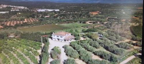 an aerial view of a house in a field at Villa Pardalot Boutique Stays in Benicarló