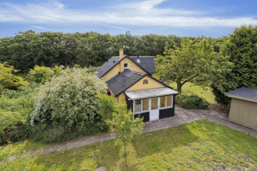an aerial view of a house with a yard at Cozy And Personal Village House in Hjørring