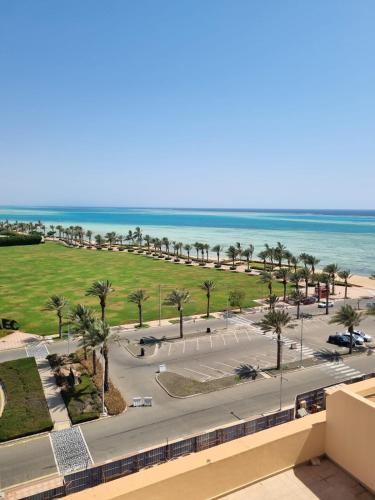 a view of the beach from the balcony of a resort at downtown star in King Abdullah Economic City