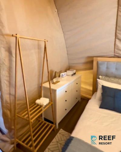 Postel nebo postele na pokoji v ubytování Reef Resort Unit C4